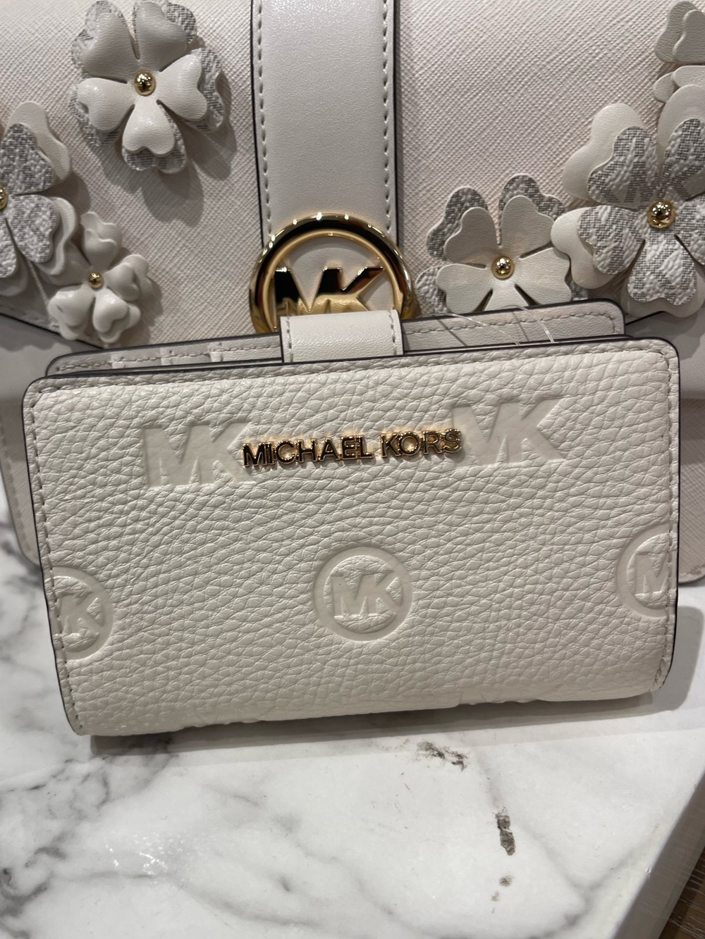 Michael Kors Jet Set Travel Med MK Logo Debossed Bifold Wallet
Light Cream
NWT